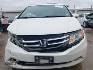 2016 Honda Odyssey Touring Elite with VIN 5FNRL5H9XGB100116, listed as a IAAI auction lot 41543464 with 160,763 mi miles and . Bid and sale history available at DreamBid. Image 6.