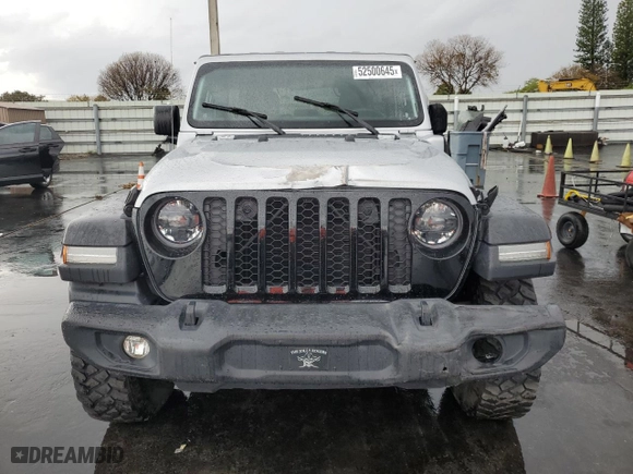 2023 Jeep Wrangler 4xe with VIN 1C4JJXN65PW661358, listed as a Copart auction lot 52500645 with 39,667 mi miles and Clean Title. Bid and sale history available at carsss.com. Image 5.