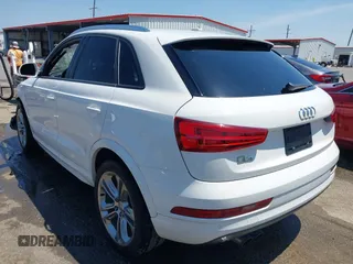 2018 Audi Q3 Premium with VIN WA1BCCFS4JR000455, listed as a IAAI auction lot 42042811 with 57,354 mi miles. Bid and sale history available at carsss.com. Image 3.