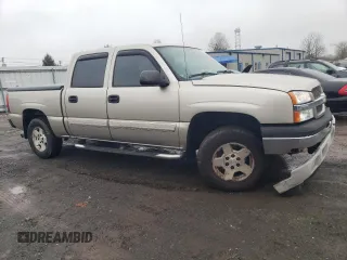 2005 Chevrolet Silverado 1500 LT with VIN 2GCEK13T151287338, listed as a Copart auction lot 52005655 with 191,783 mi miles and Salvage Title. Bid and sale history available at DreamBid. Image 4.