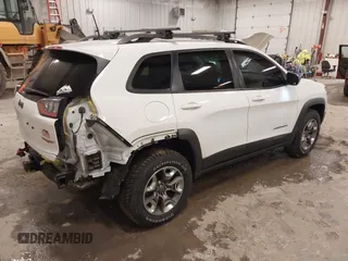 2019 Jeep Cherokee Trailhawk with VIN 1C4PJMBX4KD390061, listed as a IAAI auction lot 42007112 with 72,227 mi miles and . Bid and sale history available at DreamBid. Image 4.
