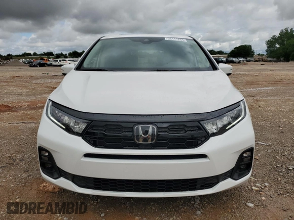 2025 Honda Odyssey Touring with VIN 5FNRL6H8XSB039033, listed as a Copart auction lot 56111255 with 4,842 mi miles and Salvage title. Bid and sale history available at DreamBid. Image 5.