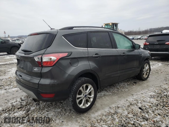 2017 Ford Escape SE with VIN 1FMCU9GD2HUB01278, listed as a Copart auction lot 83115634 with 112,753 mi miles and Clean Title. Bid and sale history available at carsss.com. Image 3.