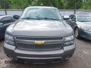 2011 Chevrolet Suburban LT with VIN 1GNSCJE03BR267184, listed as a IAAI auction lot 42156424 with 307,618 mi miles. Bid and sale history available at carsss.com. Image 12.