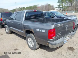 2006 Dodge Dakota SLT with VIN 1D7HW48N96S689743, listed as a IAAI auction lot 41772735 with 258,532 mi miles. Bid and sale history available at carsss.com. Image 3.