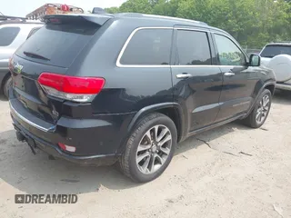 2017 Jeep Grand Cherokee Overland z VIN 1C4RJFCG4HC632929, wystawiony jako IAAI lot #42385321 z przebiegiem 205 593 mil mil oraz . Historia ofert i sprzedaży dostępna na DreamBid. Obrazek 6.