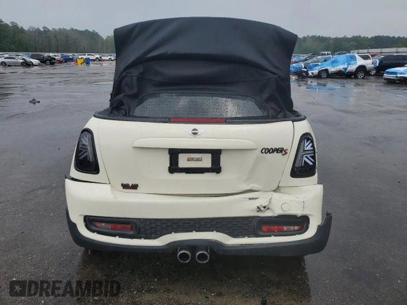 2014 MINI Convertible S с VIN WMWZP3C5XET706231, выставлен на аукционе Copart как лот 55610615 с пробегом 70 416 миль миль и Списание • Salvage title. История ставок и продаж доступна на DreamBid. Изображение 6.