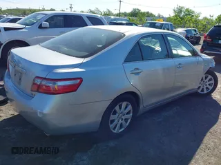 2007 Toyota Camry LE z VIN JTNBK46K473003622, wystawiony jako IAAI lot #42286264 z przebiegiem 105 630 mil mil oraz . Historia ofert i sprzedaży dostępna na DreamBid. Obrazek 4.