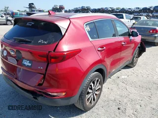 2018 Kia Sportage EX with VIN KNDPN3ACXJ7423171, listed as a IAAI auction lot 41997356 with 84,947 mi miles and . Bid and sale history available at DreamBid. Image 4.