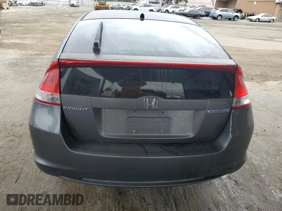 2011 Honda Insight EX with VIN JHMZE2H77BS006079, listed as a Copart auction lot 63873985 with 134,159 mi miles and Salvage title. Bid and sale history available at DreamBid. Image 6.