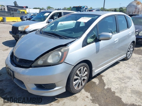 2013 Honda Fit Sport with VIN JHMGE8H51DC005760, listed as a IAAI auction lot 42040427 with 184,375 mi miles. Bid and sale history available at carsss.com. Image 2.