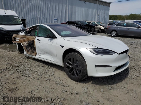 2022 Tesla Model S Plaid with VIN 5YJSA1E63NF460643, listed as a Copart auction lot 54665505 with Not provided miles and Salvage title. Bid and sale history available at DreamBid. Image 4.
