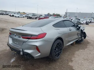 2020 BMW M8 with VIN WBSAE0C02LCE17524, listed as a IAAI auction lot 41374594 with 48,197 mi miles. Bid and sale history available at carsss.com. Image 4.
