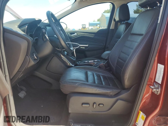 2016 Ford Escape Titanium z VIN 1FMCU9J99GUA91223, wystawiony jako Copart lot #54666545 z przebiegiem 109 684 mil mil oraz Szkoda całkowita • Salvage title. Historia ofert i sprzedaży dostępna na DreamBid. Obrazek 7.