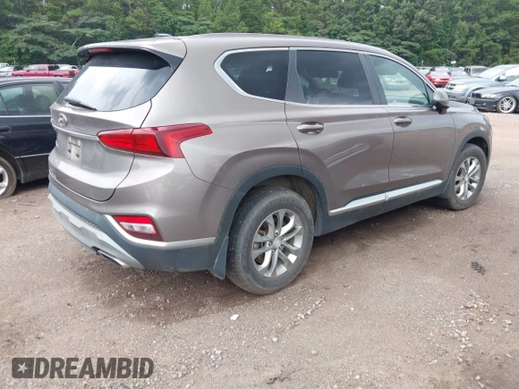 2020 Hyundai Santa Fe SE with VIN 5NMS23AD4LH142202, listed as a IAAI auction lot 42526020 with 59,964 mi miles and . Bid and sale history available at DreamBid. Image 4.