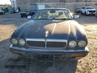 1995 Jaguar XJ with VIN SAJKX1747SC722815, listed as a Copart auction lot 83743934 with Not Provided miles and Clean Title. Bid and sale history available at DreamBid. Image 5.