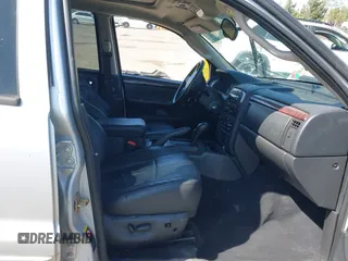 2004 Jeep Grand Cherokee Limited with VIN 1J8GW58N44C390592, listed as a IAAI auction lot 42150161 with Not provided miles and . Bid and sale history available at DreamBid. Image 5.