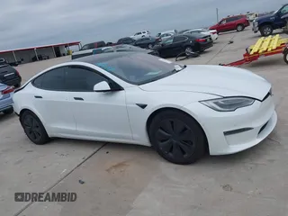 2021 Tesla Model S Plaid z VIN 5YJSA1E64MF452744, wystawiony jako IAAI lot #41375136 z przebiegiem Nie podano mil oraz . Historia ofert i sprzedaży dostępna na DreamBid. Obrazek 12.