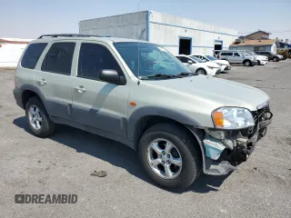 2005 Mazda Tribute i with VIN 4F2YZ02Z65KM01780, listed as a Copart auction lot 70890314 with 119,107 mi miles and Salvage Title. Bid and sale history available at carsss.com. Image 4.