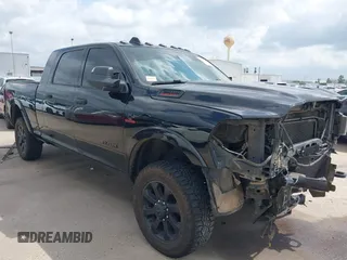 2019 Ram 2500 Laramie with VIN 3C6UR5NL7KG530348, listed as a IAAI auction lot 42155657 with 165,208 mi miles and . Bid and sale history available at DreamBid. Image 1.