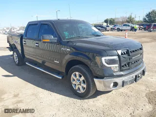 2013 Ford F-150 XL with VIN 1FTFW1CT5DKF20404, listed as a IAAI auction lot 41153325 with 148,608 mi miles. Bid and sale history available at carsss.com. Image 1.