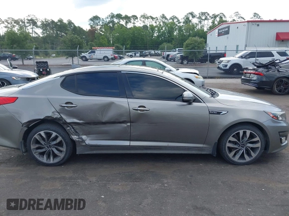 2015 Kia Optima SXL Turbo с VIN 5XXGR4A60FG513223, выставлен на аукционе IAAI как лот 42590539 с пробегом 181 035 миль миль и . История ставок и продаж доступна на DreamBid. Изображение 13.
