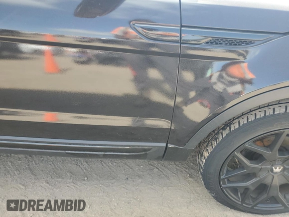 2012 Land Rover Range Rover Evoque Prestige Premium with VIN SALVV2BG7CH659558, listed as a Copart auction lot 57055965 with 117,008 mi miles and Salvage title. Bid and sale history available at DreamBid. Image 13.