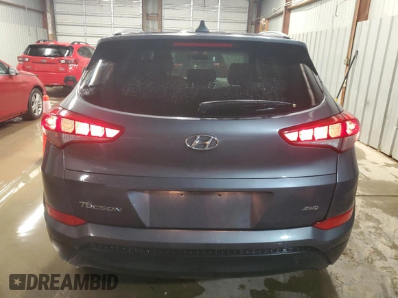 2018 Hyundai Tucson SEL with VIN KM8J3CA46JU734310, listed as a Copart auction lot 57978435 with 128,379 mi miles and Clean title. Bid and sale history available at DreamBid. Image 6.