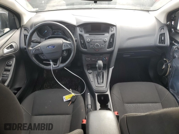 2017 Ford Focus SE with VIN 1FADP3F23HL346695, listed as a Copart auction lot 81313874 with 89,577 mi miles and Salvage title. Bid and sale history available at DreamBid. Image 8.