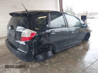 2013 Honda Fit Sport with VIN JHMGE8H57DC033384, listed as a IAAI auction lot 41871356 with 150,777 mi miles. Bid and sale history available at carsss.com. Image 4.