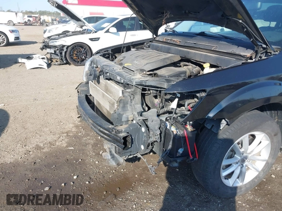 2013 Dodge Journey SXT with VIN 3C4PDCBG7DT710844, listed as a IAAI auction lot 40582910 with 136,741 mi miles and . Bid and sale history available at DreamBid. Image 6.