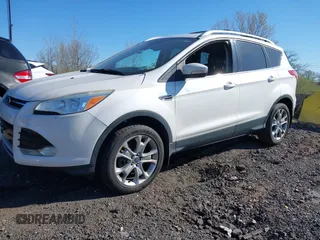 2013 Ford Escape SEL with VIN 1FMCU9HX2DUC40443, listed as a IAAI auction lot 42047208 with 194,413 mi miles. Bid and sale history available at carsss.com. Image 2.