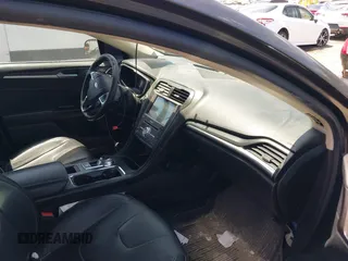 2017 Ford Fusion Titanium с VIN 3FA6P0K99HR136596, выставлен на аукционе IAAI как лот 42347238 с пробегом 149 749 миль миль и . История ставок и продаж доступна на DreamBid. Изображение 5.