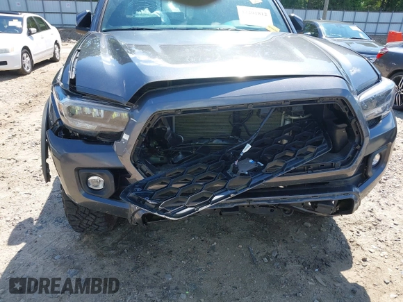 2023 Toyota Tacoma SR with VIN 3TMCZ5AN9PM553246, listed as a IAAI auction lot 42201812 with 20,907 mi miles and . Bid and sale history available at DreamBid. Image 6.