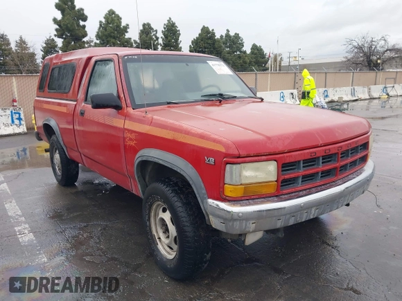 1991 Dodge Dakota z VIN 1B7GG66Y7MS210454, wystawiony jako IAAI lot #41778373 z przebiegiem 151 112 mil mil oraz . Historia ofert i sprzedaży dostępna na DreamBid. Obrazek 1.