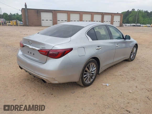 2018 Infiniti Q50 3.0t Luxe with VIN JN1EV7AR0JM433540, listed as a IAAI auction lot 42129284 with 105,966 mi miles. Bid and sale history available at carsss.com. Image 4.