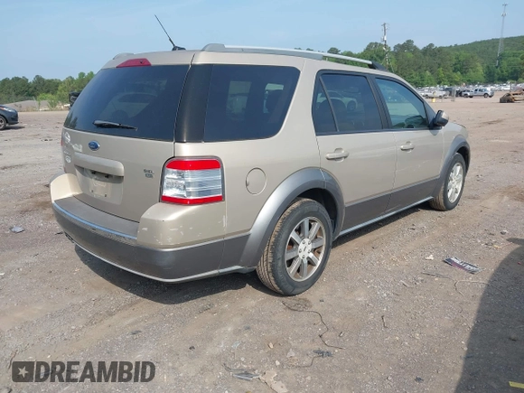 2008 Ford Taurus X SEL with VIN 1FMDK05W58GA17450, listed as a IAAI auction lot 42144238 with 190,621 mi miles and . Bid and sale history available at DreamBid. Image 4.