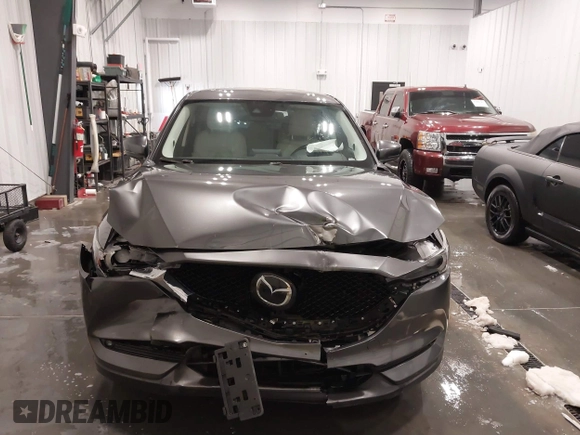 2017 Mazda CX-5 Grand Touring with VIN JM3KFADLXH0151593, listed as a IAAI auction lot 41823378 with 149,299 mi miles. Bid and sale history available at carsss.com. Image 12.