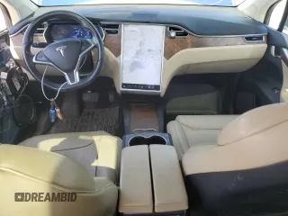 2017 Tesla Model X 90D with VIN 5YJXCDE23HF044790, listed as a Copart auction lot 52376565 with 105,712 mi miles and Salvage Title. Bid and sale history available at DreamBid. Image 8.