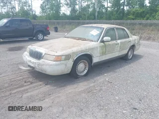 2001 Mercury Grand Marquis LS with VIN 2MEFM75WX1X633210, listed as a IAAI auction lot 42092135 with 161,963 mi miles and . Bid and sale history available at DreamBid. Image 2.