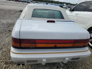 1994 Chrysler LeBaron z VIN 1C3EU4530RF259672, wystawiony jako Copart lot #80346444 z przebiegiem Nie podano mil oraz Szkody całkowita. Historia ofert i sprzedaży dostępna na DreamBid. Obrazek 6.