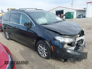 2020 Chrysler Voyager LXI with VIN 2C4RC1DG2LR262141, listed as a IAAI auction lot 41711714 with 136,011 mi miles. Bid and sale history available at carsss.com. Image 1.