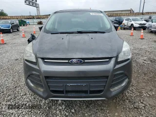 2016 Ford Escape SE z VIN 1FMCU9G97GUB40023, wystawiony jako Copart lot #61405935 z przebiegiem 107 591 mil mil oraz Czysty tytuł • Clean title. Historia ofert i sprzedaży dostępna na DreamBid. Obrazek 5.