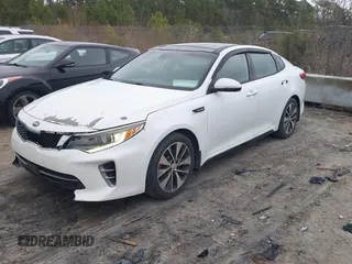 2016 Kia Optima SX Turbo with VIN 5XXGW4L26GG021476, listed as a IAAI auction lot 41737714 with 244,739 mi miles and . Bid and sale history available at carsss.com. Image 2.