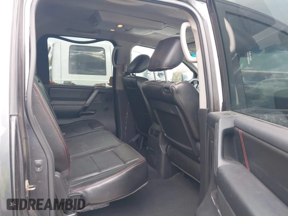 2011 Nissan Titan Pro-4X with VIN 1N6BA0EC3BN320795, listed as a IAAI auction lot 41868113 with 183,919 mi miles and . Bid and sale history available at DreamBid. Image 8.