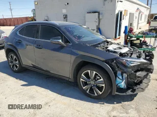 2022 Lexus UX with VIN JTHX3JBH4N2056306, listed as a Copart auction lot 72589624 with 11,991 mi miles and Salvage Title. Bid and sale history available at carsss.com. Image 4.