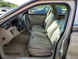 2007 Cadillac DTS Luxury I z VIN 1G6KD57Y57U120596, wystawiony jako Copart lot #55058175 z przebiegiem 119 593 mil mil oraz Szkoda całkowita • Salvage title. Historia ofert i sprzedaży dostępna na DreamBid. Obrazek 7.