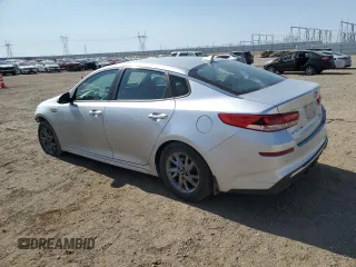 2019 Kia Optima LX z VIN 5XXGT4L31KG329150, wystawiony jako Copart lot #59225935 z przebiegiem 58 253 mil mil oraz Szkoda całkowita • Salvage title. Historia ofert i sprzedaży dostępna na DreamBid. Obrazek 2.