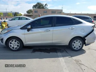 2012 Ford Fiesta SE with VIN 3FADP4BJ2CM150953, listed as a IAAI auction lot 42010904 with 77,637 mi miles. Bid and sale history available at carsss.com. Image 14.