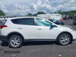 2014 Toyota RAV4 Limited with VIN 2T3DFREV0EW165977, listed as a IAAI auction lot 42679390 with 59,874 mi miles and . Bid and sale history available at DreamBid. Image 13.